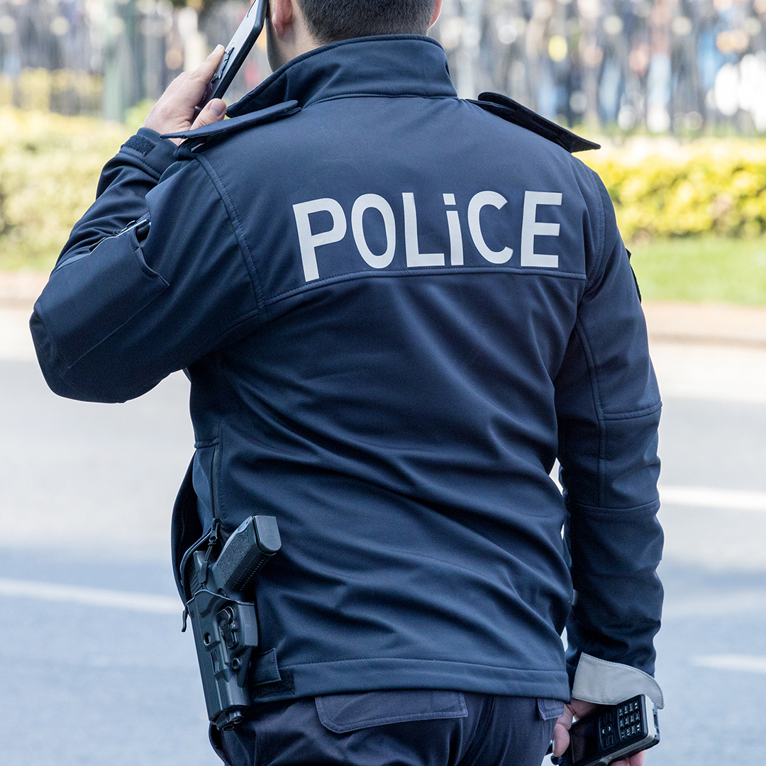 Police officer using a phone